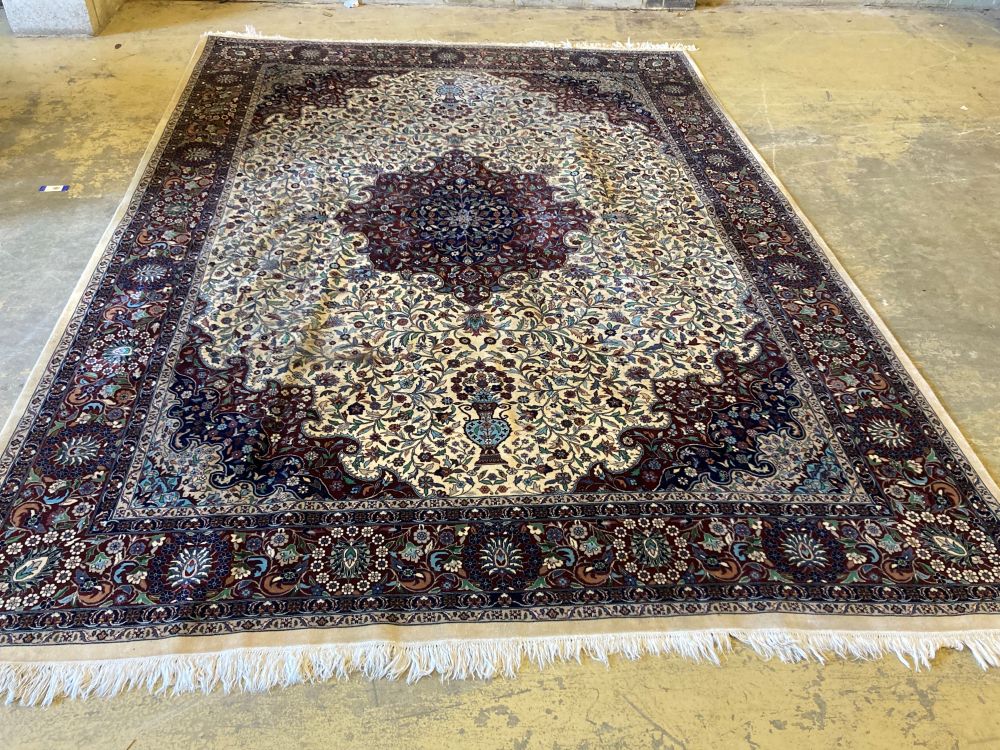 A large Persian cream ground carpet, 280 x 387cm